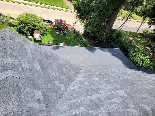 Close view of a finished gray shingle roof